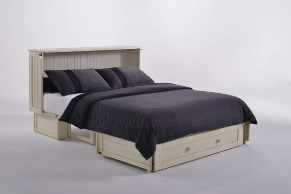 open chest bed with dark bedding